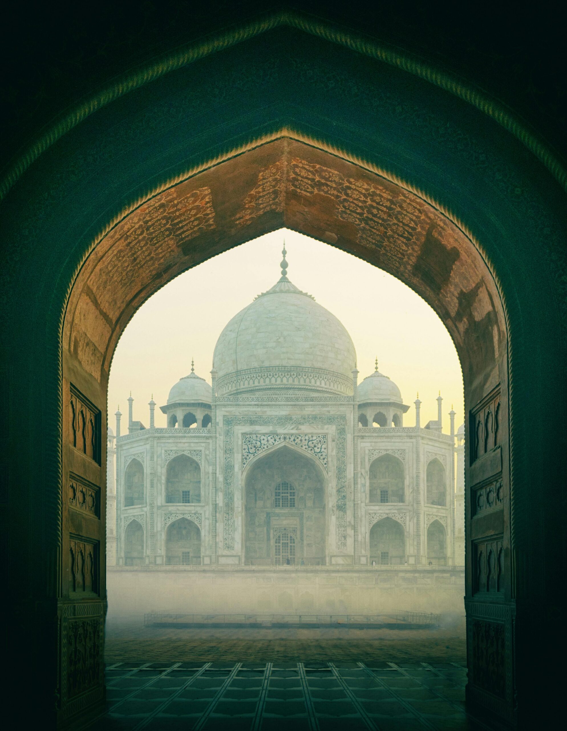 Taj Mahal in Agra a large building with domes and arches